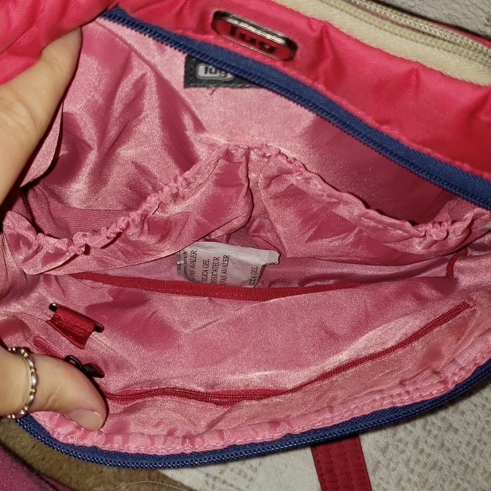 Lug 'swing' crossbody bag, hot pink, 3 sectioned pockets.